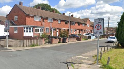 School Road with pedestrian and cycle zone signs