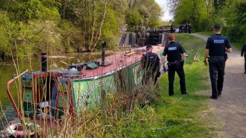 Narrow boat and police officers