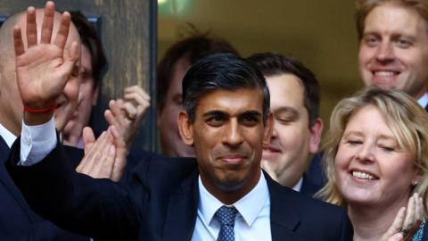 New leader of the Britain's Conservative Party Rishi Sunak walks outside the Conservative Campaign Headquarters, in London, Britain October 24, 2022.