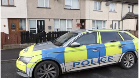 A police car outside a house in Rathfriland