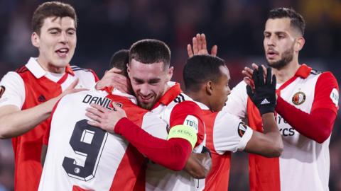 Feyenoord players celebrate their 7-0 win