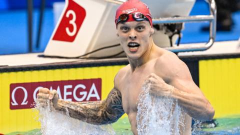 Matt Richards celebrates winning 200m freestyle gold for Great Britain