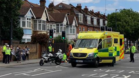 The accident scene on the Upper Richmond Road in London