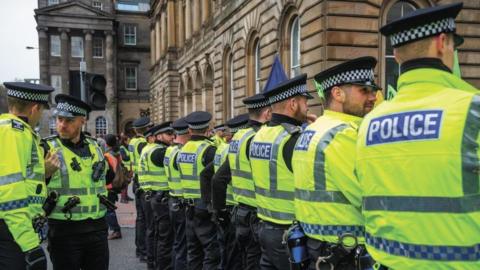 Police at climate change protest in Glasgow