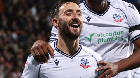 Josh Sheehan celebrates scoring for Bolton