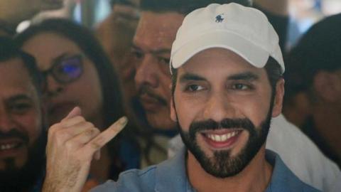 El Salvador's President Nayib Bukele, who is running for reelection, and his wife Gabriela de Bukele show their inked fingers during the presidential and parliamentary elections in San Salvador, El Salvador, February 4, 2024.