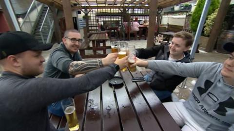 Men drinking in beer garden