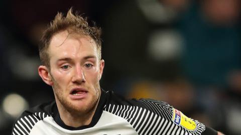 Matt Clarke in action for Derby County