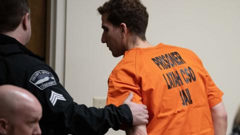 Bryan Kohberger, in an orange prison jumpsuit, is led away at the end of a hearing in Latah County District Court on 5 January, 2023, in Moscow, Idaho