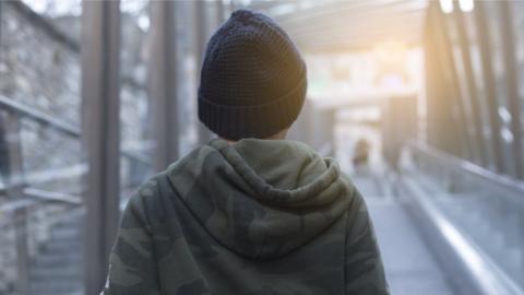 Boy in hoodie and hat