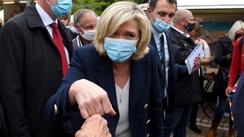 President of French far-right party of the National Rally Marine Le Pen on the campaign trail