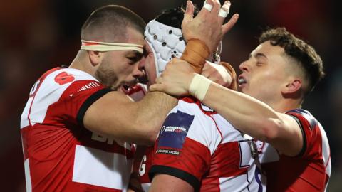 Ben Morgan celebrates scoring a try