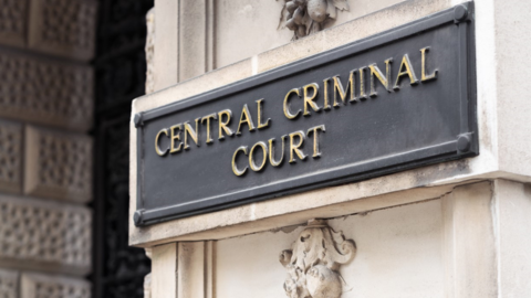 Central Criminal Court sign on the Old Bailey building