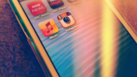 An iPod touch with icons for BBC News, BBC iPlayer and Instagram