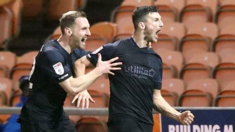 Matty Pearson celebrates his goal at Blackpool