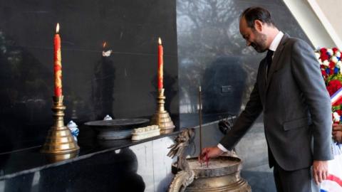 Edouard Philippe pays respect at the Dien Bien Phu Cemetery in Dien Bien Phu on November 3, 2018