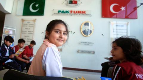 Students wait in the corridor for their ride home after school at the PAKTURK International Schools and Colleges in Peshawar, Pakistan November 17, 2016