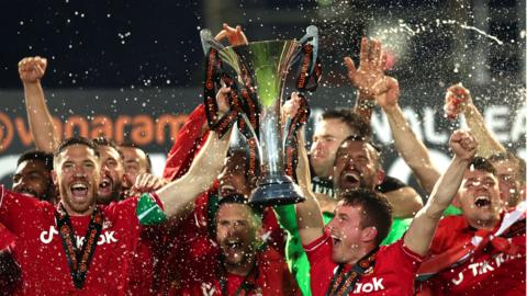 Wrexham players celebrate promotion