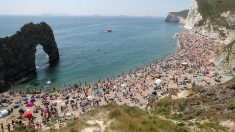 Earlier in the day crowds of people flocked to the popular beauty spot