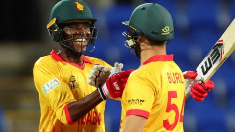 Milton Shumba and Ryan Burl celebrates Zimbabwe's win over Scotland at the T20 World Cup