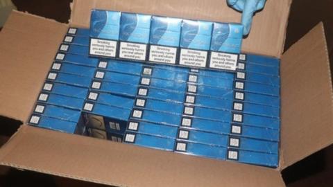 Blue cigarette boxes