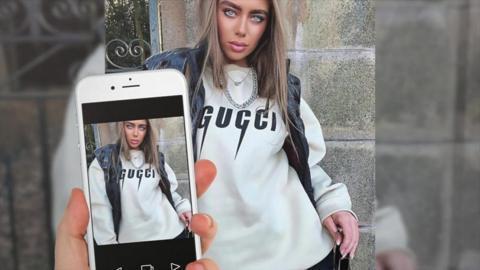 Influencer wearing fake Gucci jumper