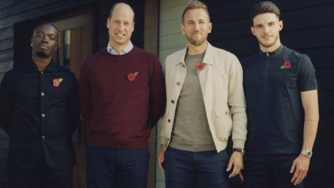 Prince of Wales with host Kelvyn Quagraine (left) and footballers Harry Kane and Declan Rice (right)