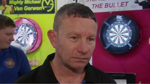 Karl Holden from St Helen's Darts Academy speaking to the tv ahead of the PDC World Darts Championship final