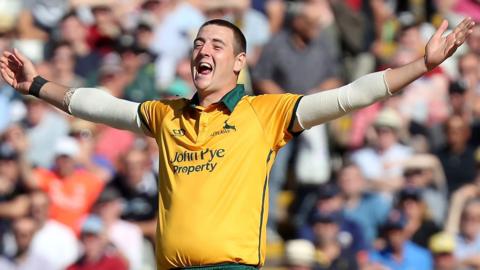 Matt Carter celebrates a wicket for Nottinghamshire