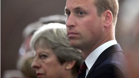 Prince William and Theresa May in Amiens