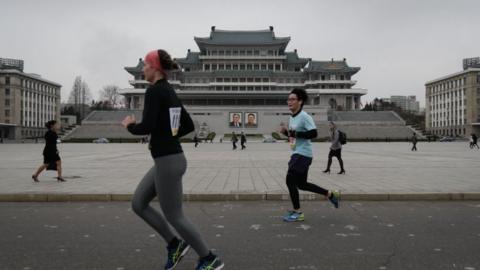 Runners in Pyongyang's annual marathon