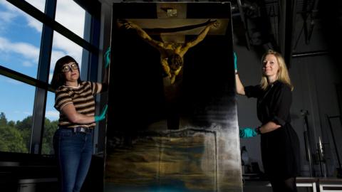 Frames Conservator Sophie Kostin and Painting Conservator Suzanne Ross with the painting at the Glasgow Museums Resource Centre