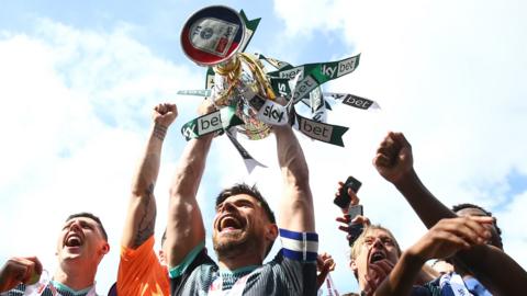 Plymouth Argyle lift the League One trophy