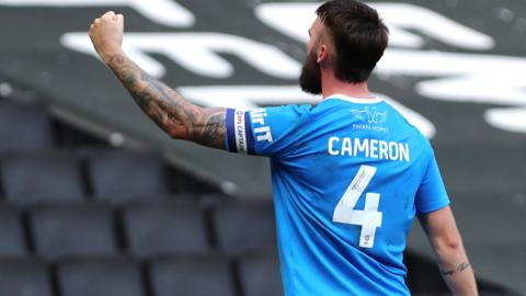 Kyle Cameron celebrates scoring for Notts County