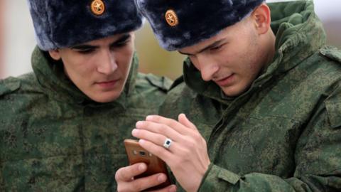 Conscripts departing for service during a seeing-off ceremony at a military enlistment office of the Chechen Republic