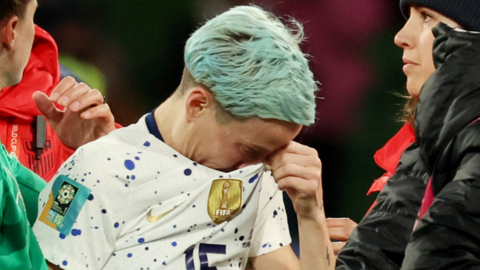 United States player Megan Rapinoe reacts after the defending champions are knocked out of the Women's World Cup by Sweden
