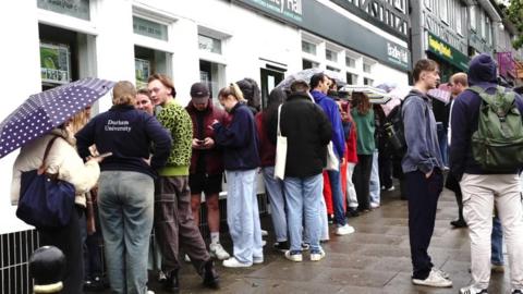 Students queuing outside estate agents in October