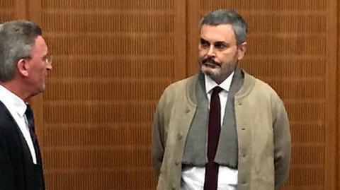 John Ausonius, dubbed the "laser man", waits for the start of his trial in Frankfurt, Germany, December 13, 2017