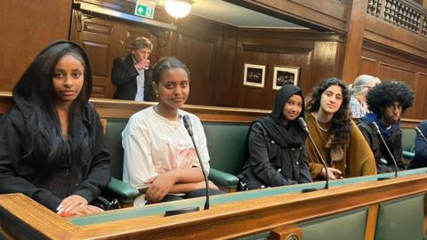 Left and right: LMisgana Kahsay, 17, Dianna Weldemichael, 16, Shamme Neby, 13, Layan Alkebsi, 16 and Samuel Tesfaye, 17