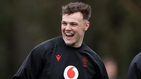 Jarrod Evans smiling in training 