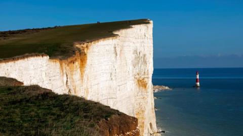 England, East Sussex, Eastbourne, Beachy Head, The Seven Sisters Cliffs and Beachy Head Lighthouse. 