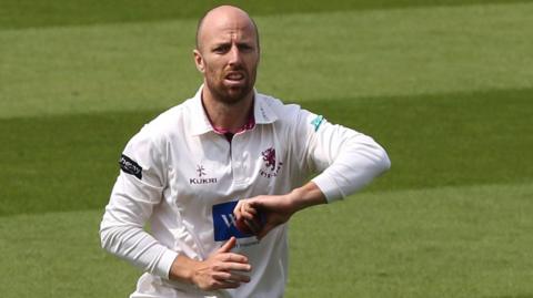 Somerset's Jack Leach runs up to bowl