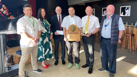 Photo left to right: Chef lecturer TGI College Rivelino Rodriguez, head of department, hospitality & catering TGI College Sally Warburton-Ward,  Carlo Cavagnetto, Harry Gribbens, Mario Cavagnetto and president Lions Club of Guernsey Paul Allaway.