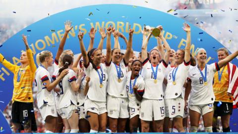 The United States lifting the Women's World Cup trophy in 2019