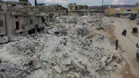 Buildings in the town of Harem in Idlib, have been reduced to rubble after an earthquake struck Turkey and Syria