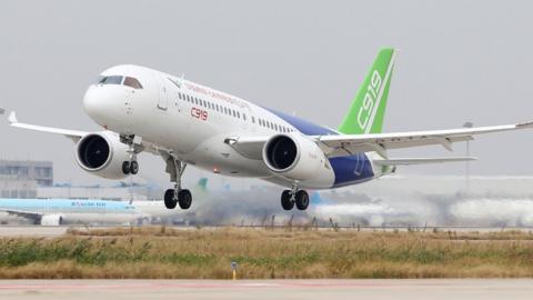 Comac C919, China's first large passenger jet, takes off from Pudong International Airport in Shanghai on 10 November 2017