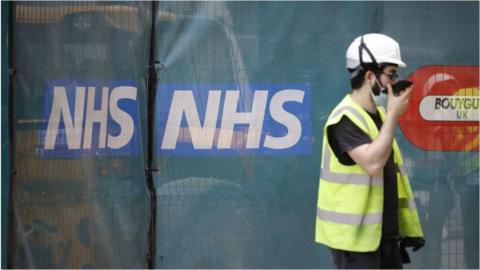 Worker at an NHS building site