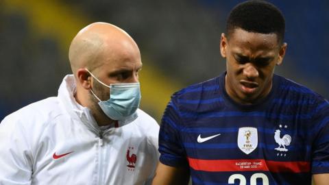 Anthony Martial reacts after receiving treatment during France's World Cup qualifier with Kazakhstan