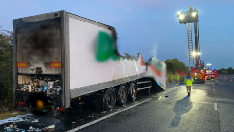 Firefighters attending lorry fire