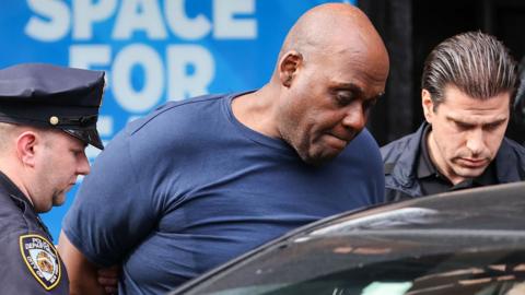 Frank James, 62, suspected of opening fire in a crowded New York City subway station is shown being taken into custody